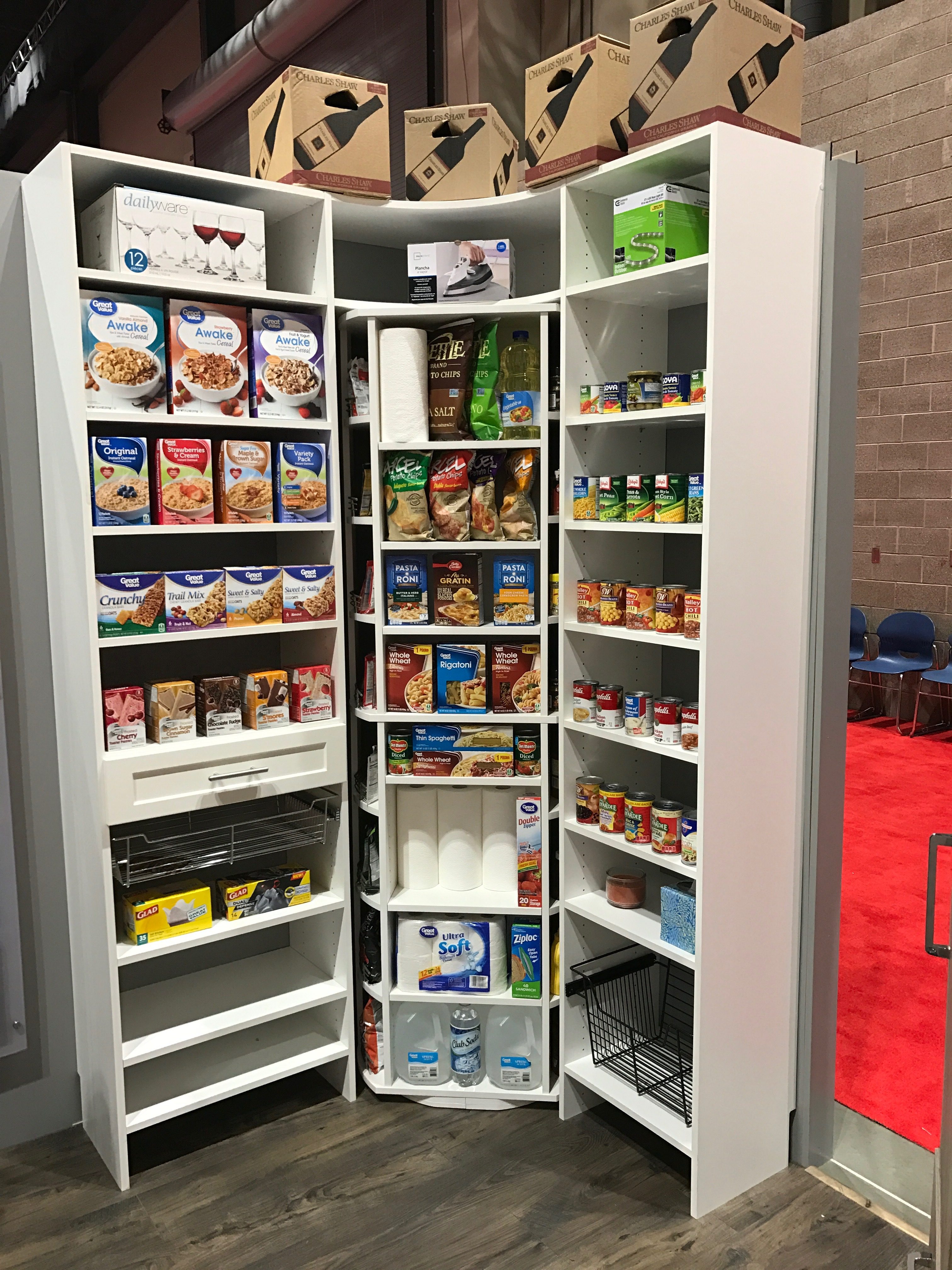 Hidden revolving storage pantry – B2B closet manufacturing showroom