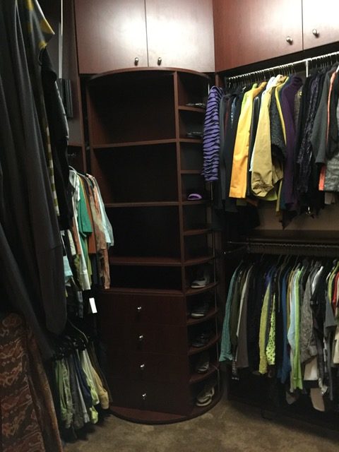 Automated storage for luxury master suites – revolving closet system installed